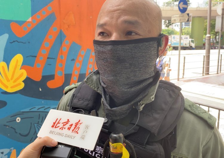 港警新警告旗已下发一线 “光头刘sir”：今天起使用